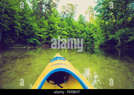 Vintage photo of beautiful Krutynia river landscape photographed from kayak. Photo with vintage mood effect Stock Photo