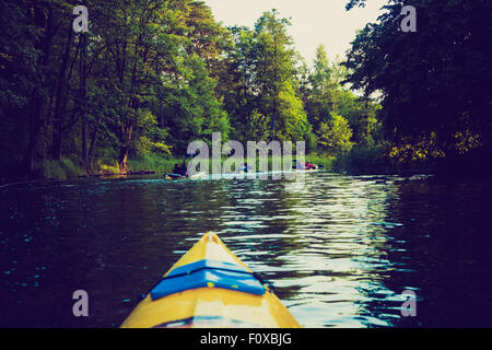 Vintage photo of beautiful Krutynia river landscape photographed from kayak. Photo with vintage mood effect Stock Photo