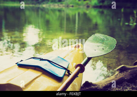 Vintage photo of beautiful Krutynia river landscape photographed from kayak. Photo with vintage mood effect Stock Photo