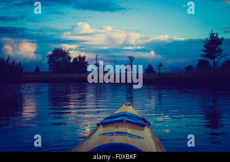 Vintage photo of beautiful Krutynia river landscape photographed from kayak. Photo with vintage mood effect Stock Photo