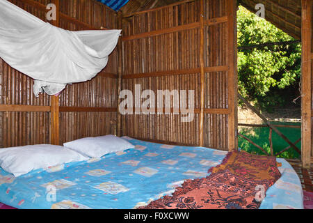 Sleeping room at TAM GIA RAFT HOUSE on CHEOW EN LAKE in KHAO SOK NATIONAL PARK - THAILAND Stock Photo