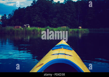 Vintage photo of beautiful Krutynia river landscape photographed from kayak. Photo with vintage mood effect Stock Photo