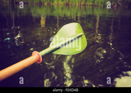 Vintage photo of beautiful Krutynia river landscape photographed from kayak. Photo with vintage mood effect Stock Photo