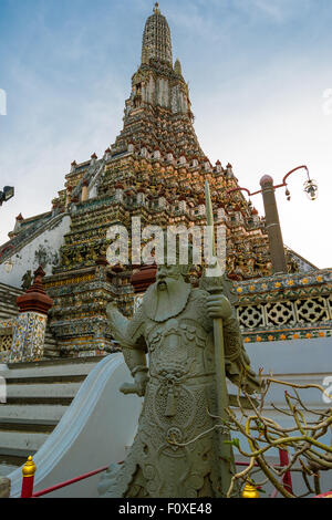 Wat Arun or Wat Chaeng, is situated on the west bank of the Chao Phraya River. Wat Arun or temple of the dawn is partly made up  Stock Photo