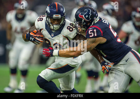 Houston, Texas, USA. 22nd Aug, 2015. Denver Broncos wide receiver Demaryius Thomas (88) is tackled by Houston Texans linebacker John Simon (51)after a reception during the first half of an NFL preseason game between the Houston Texans and the Denver Broncos at NRG Stadium in Houston, TX on August 22nd, 2015. Credit:  Trask Smith/ZUMA Wire/Alamy Live News Stock Photo