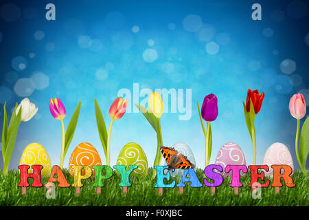 happy easter concept with tulips and easter eggs Stock Photo