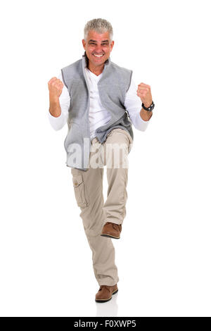 excited middle aged man holding fists on white background Stock Photo