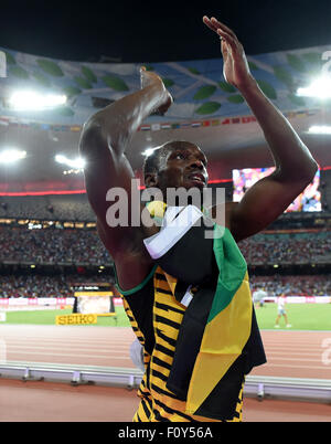 Beijing, China. 23rd Aug, 2015. Usain Bolt of Jamaica celebrates after the men's 100m final at the 2015 IAAF World Championships in Beijing, capital of China, on Aug. 23, 2015. Credit:  Xinhua/Alamy Live News Stock Photo