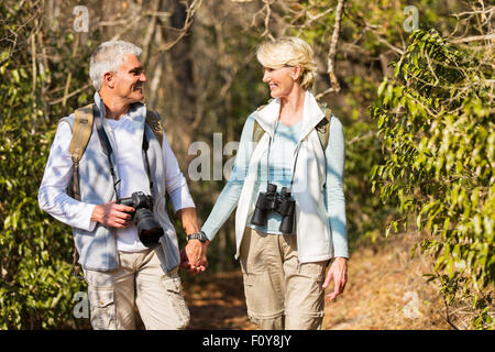 happy mature couple hiking in mountain Stock Photo