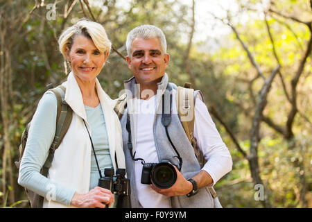 happy hikers couple enjoying outdoor activity Stock Photo