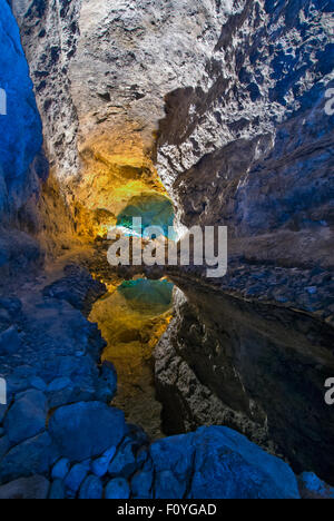 Cueva de los Verdes underground volcanic caves with rock pool and perfect optical reflection  Lanzarote Canary Islands Spain Stock Photo