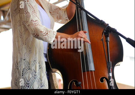 Małgorzata Babiarz, professionally known as Megitza playing the double bass. Stock Photo