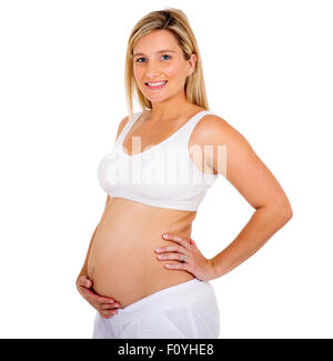 happy young pregnant woman showing her tummy Stock Photo