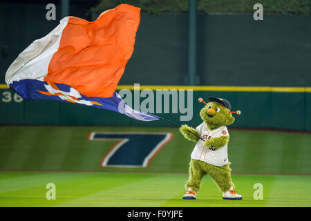 Houston Astros mascot , Orbit, waves to fans before a spring