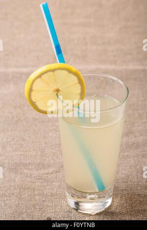 Highball of Shikanjvi homemade lemonade with lemon and ginger, spiced with cumin and saffron. Indian beverage known as nimbu pan Stock Photo