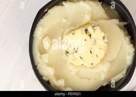 mashed potato compound butter herb baguette thyme rosemary coriander oregano fresh chopped homemade food snack tasty Stock Photo