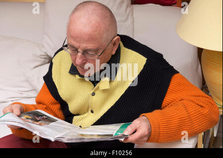 SENIOR READING Stock Photo