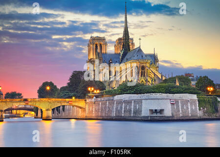 Image of Notre Dame Cathedral at dusk in Paris, France. Stock Photo