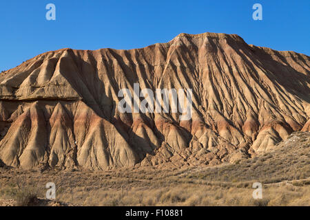 Cabezo de las Cortinas in Bardenas Reales at dusk, Navarre, Spain. Stock Photo