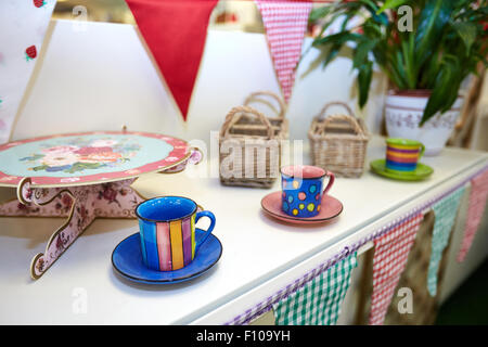 Cups and a cake stand at the Rectory Farm Cafe in Stanton St John, Oxfordshire Stock Photo