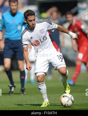 Hanover, Germany. 22nd Aug, 2015. Leverkusen's Hakan Calhanoglu in action during the German Bundesliga soccer match between Hannover 96 and Bayer 04 Leverkusen at the HDI-Arena in Hanover, Germany, 22 August 2015. Credit:  dpa picture alliance/Alamy Live News Stock Photo