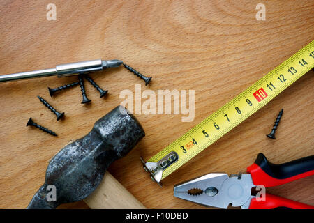Tools kit on a wood background. Home improvement concept. Stock Photo