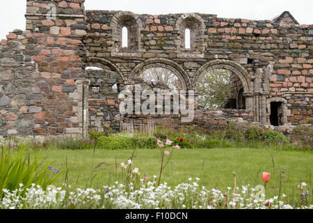 Remains of Augustinian Nunnery Church circa 1200 from across convent gardens. Iona Isle of Mull Inner Hebrides Scotland UK Stock Photo