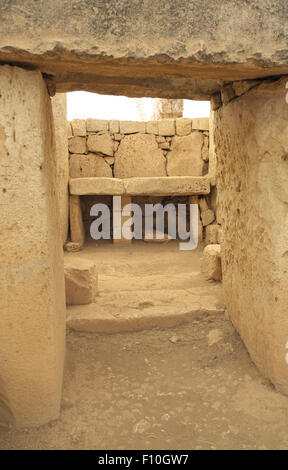 View through a doorway to an altar-like structure,  Mnajdra Temples, near Qrendi, Malta. Stock Photo