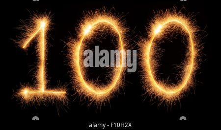 '100' number drawn with bengali sparkles isolated on black background Stock Photo