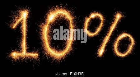 '10%' lettering drawn with bengali sparkles isolated on black background Stock Photo