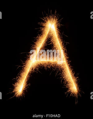 'A' letter drawn with bengali sparkles isolated on black background Stock Photo