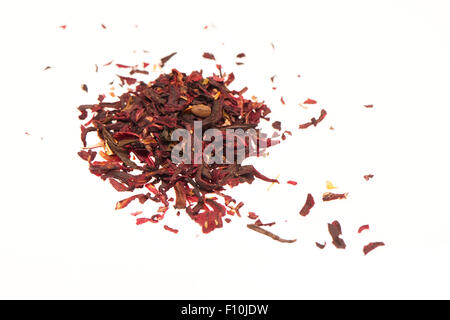Heap of dry karkade tea leaves isolated on white background Stock Photo