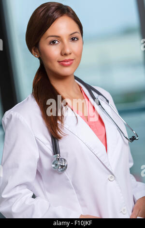 Portrait of a young happy female doctor Stock Photo