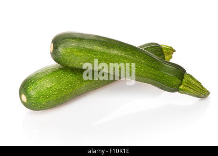 Two green zucchini isolated on white background Stock Photo