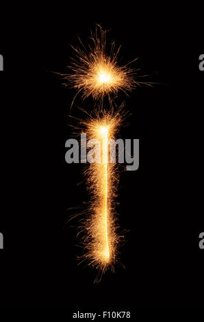 'I' letter drawn with bengali sparkles isolated on black background Stock Photo