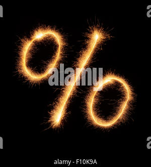 '%' symbol drawn with bengali sparkles isolated on black background Stock Photo
