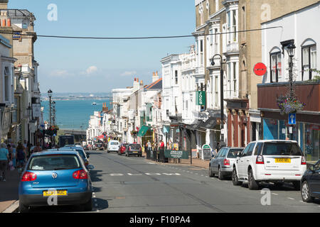 Shops in Union Street, Ryde, Isle of Wight UK in summer, with cars parked on the road. Stock Photo