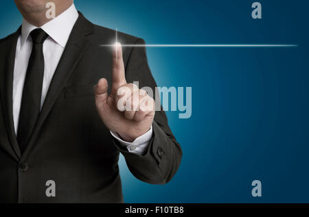 touchscreen is operated by businessman concept. Stock Photo