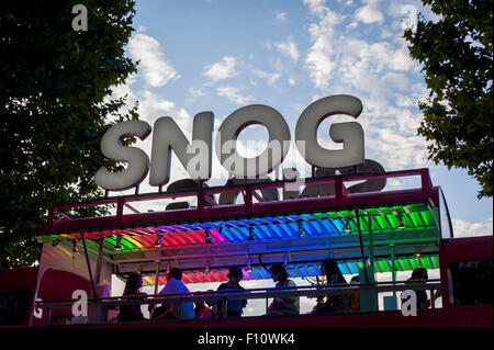 London, UK. 22 August 2015.  A sign for a frozen yoghurt company called SNOG is silhouetted against the sky on the South Bank. Stock Photo