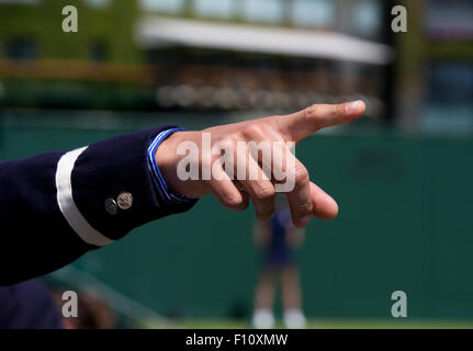 Outstretched hand of a referee at Wimbledon. Stock Photo