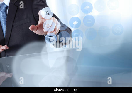 businessman hand working with www. written in search bar on modern computer interface Stock Photo