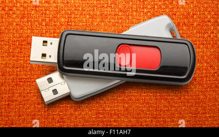 Usb flash drives on the cloth background Stock Photo