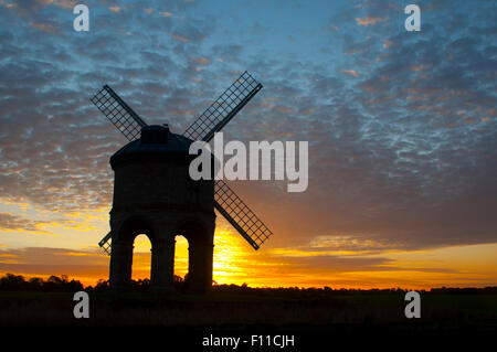 Chesterton, Warwickshire, England, UK. 25th August, 2015. UK weather. The distinctive shape of Chesterton Windmill in Warwickshire is silhouetted at sunrise. Credit:  Colin Underhill/Alamy Live News