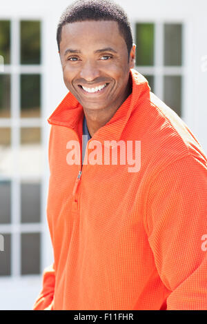 Close up of Black man smiling outdoors Stock Photo