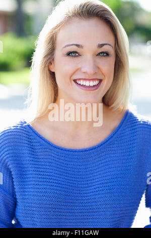 Close up of Caucasian woman smiling outdoors Stock Photo