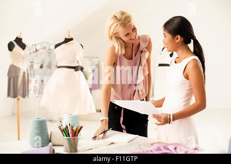 Fashion designers working together in studio Stock Photo