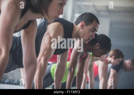 Athletes doing push-ups Stock Photo