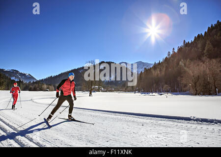 A group of cross-country skiers on the trail in Bavaria Stock Photo