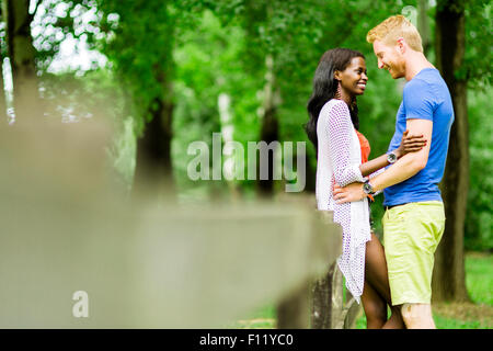 https://l450v.alamy.com/450v/f11yc0/a-happy-couple-in-love-spending-some-time-together-outdoors-in-a-park-f11yc0.jpg