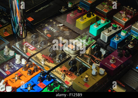 Distortion pedals for sale in the window of a music shop on Denmark Street, Soho, London aka Tin Pan Alley Stock Photo